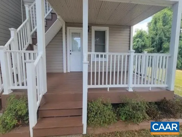 a porch with seating space