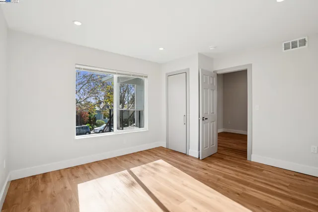 a view of a room that has a window in it