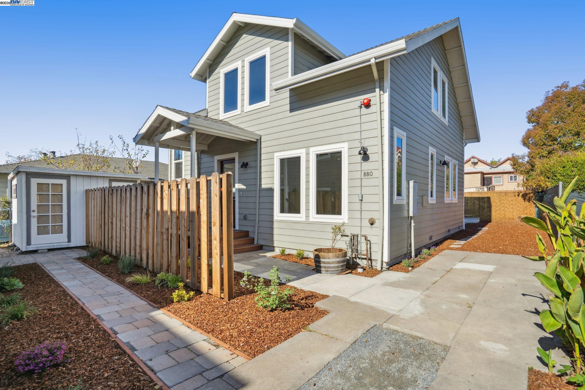 882 61st Street Oakland, CA 94608 - Photo 27 of 51 a front view of a house with garden