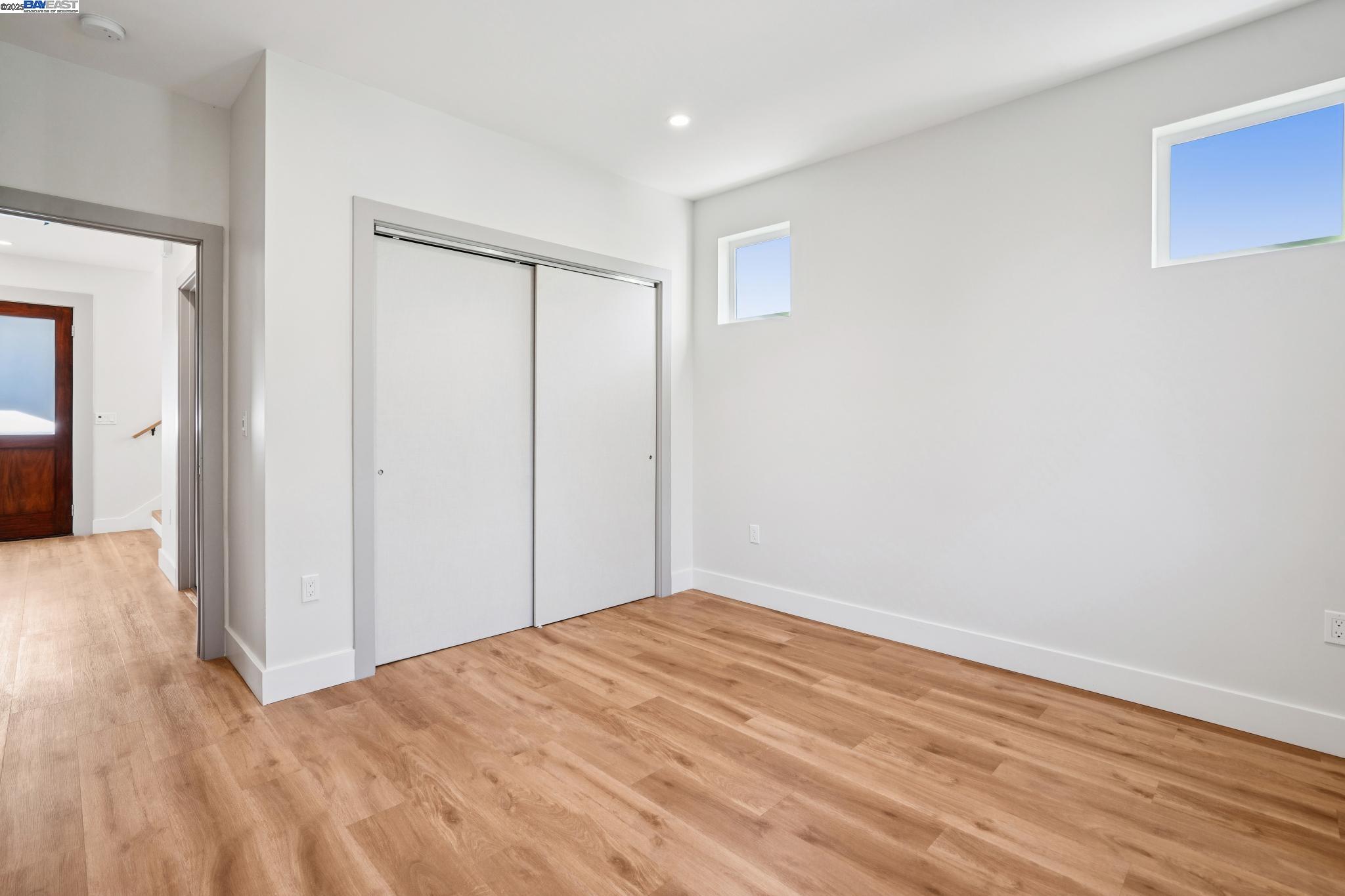 882 61st Street Oakland, CA 94608 - Photo 35 of 51 a view of empty room with wooden floor