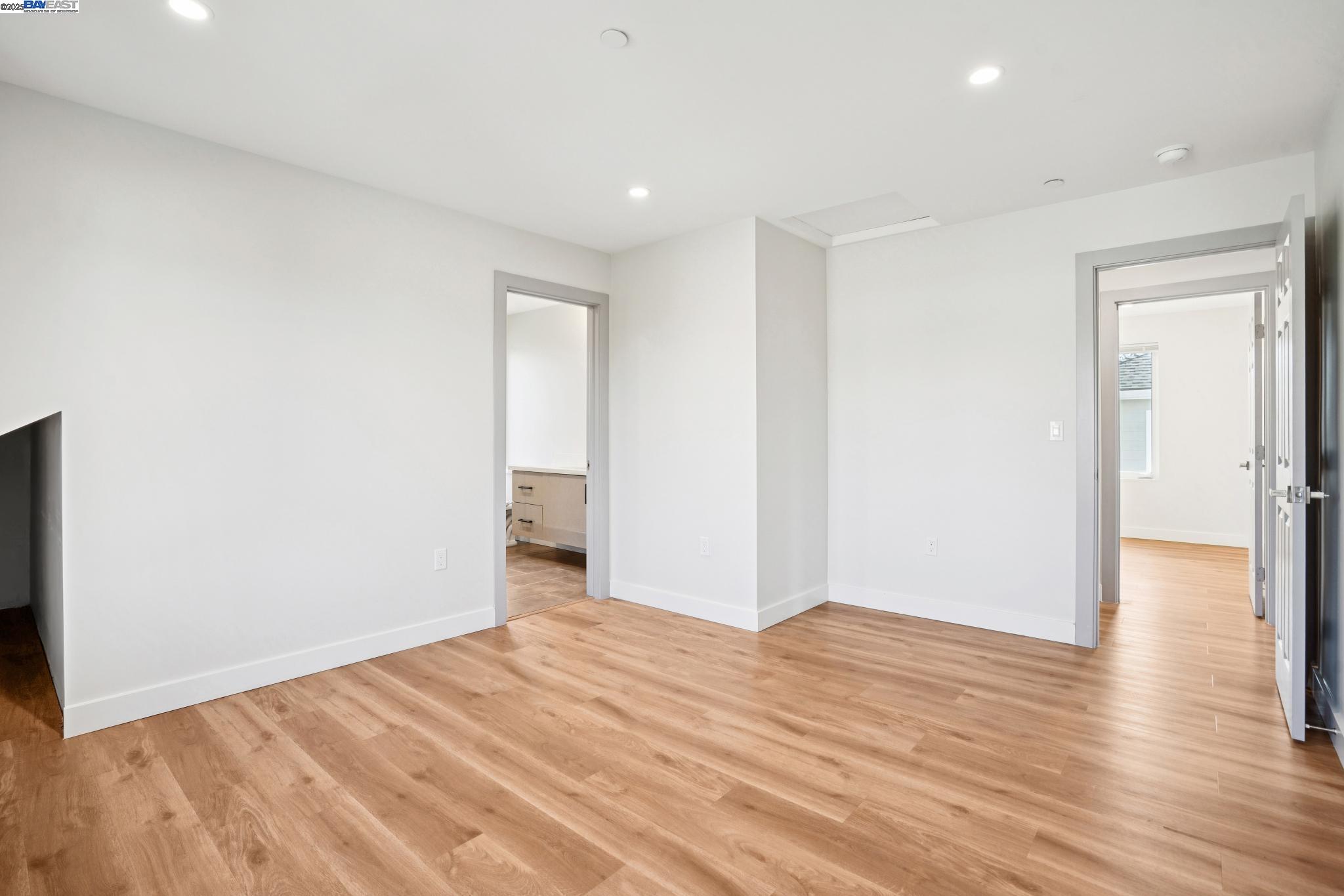 882 61st Street Oakland, CA 94608 - Photo 39 of 51 a view of an empty room with wooden floor