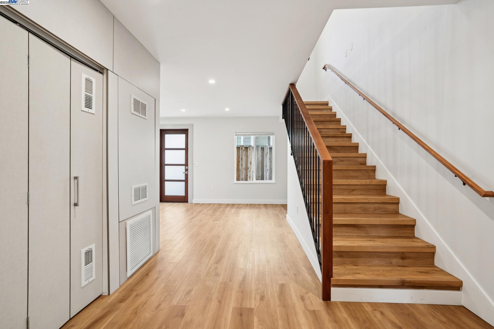 882 61st Street Oakland, CA 94608 - Photo 7 of 51 a view of an entryway with wooden floor
