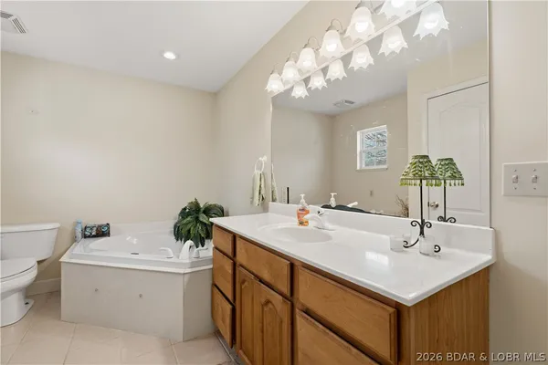 $390,000 | 60 Old Woodbridge Court, Camdenton, MO 65020