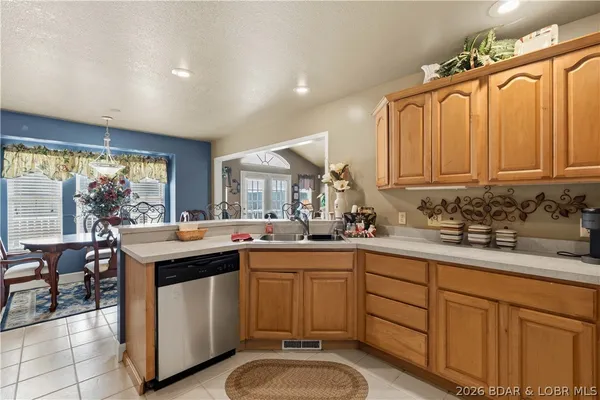 $390,000 | 60 Old Woodbridge Court, Camdenton, MO 65020