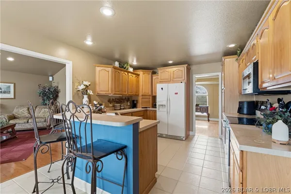 $390,000 | 60 Old Woodbridge Court, Camdenton, MO 65020