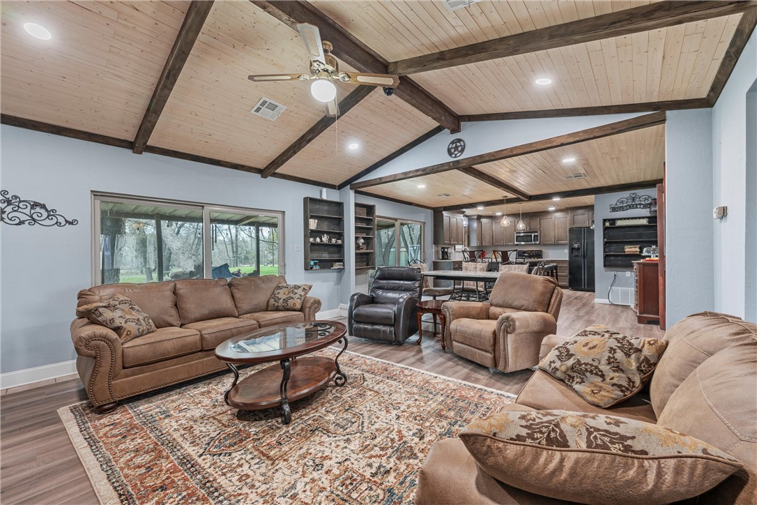 472 Coxs Oak Valley Road Waco, TX 76705 - Photo 28 of 47 a living room with furniture and a large window