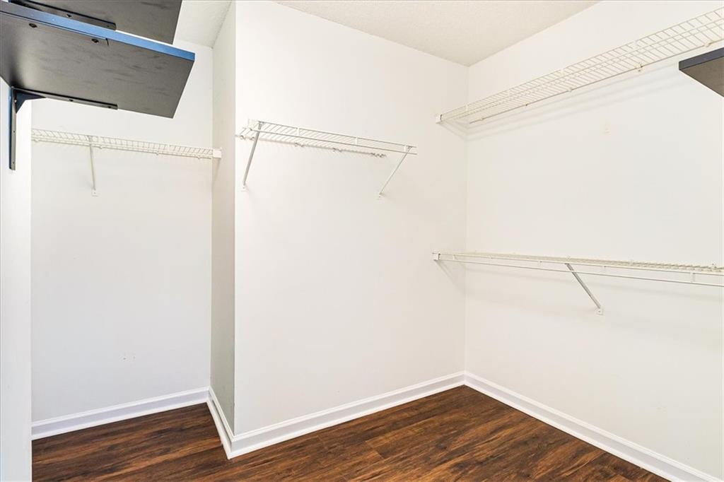 7810 Wynfield Circle Cumming, GA 30040 - Photo 23 of 47 a view of a room with wooden floor