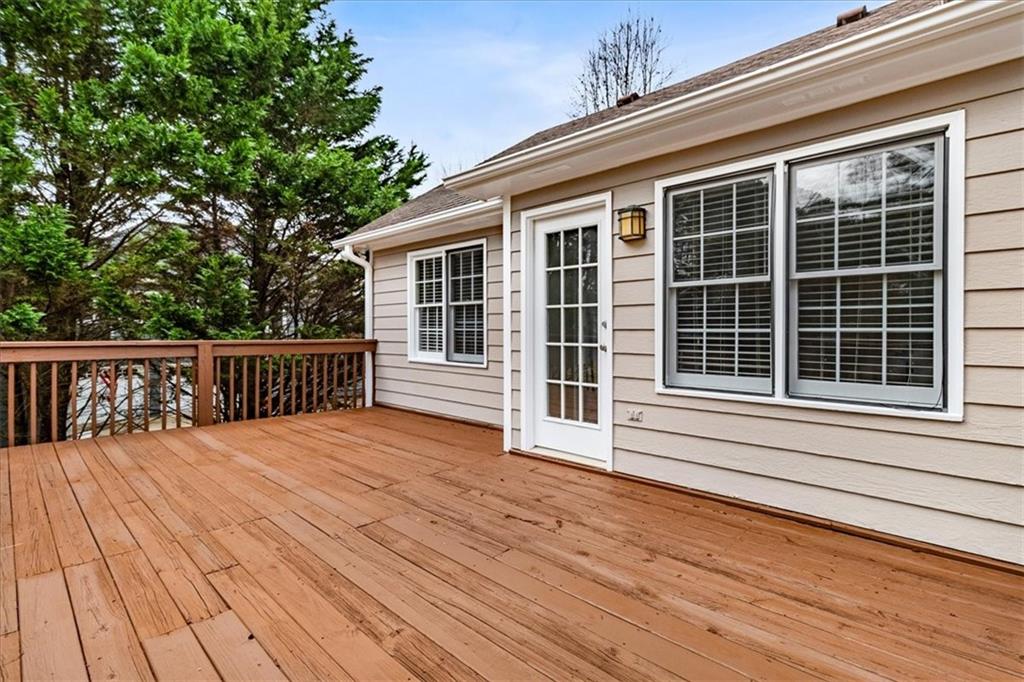 7810 Wynfield Circle Cumming, GA 30040 - Photo 45 of 47 a view of a house with wooden deck