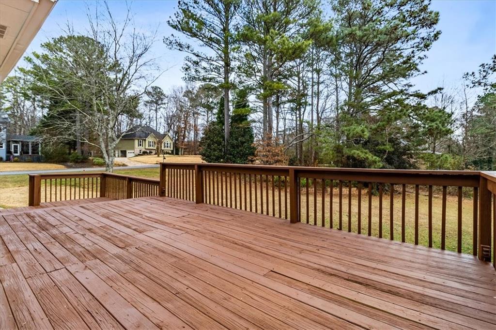 7810 Wynfield Circle Cumming, GA 30040 - Photo 46 of 47 a view of backyard with a deck and wooden floor