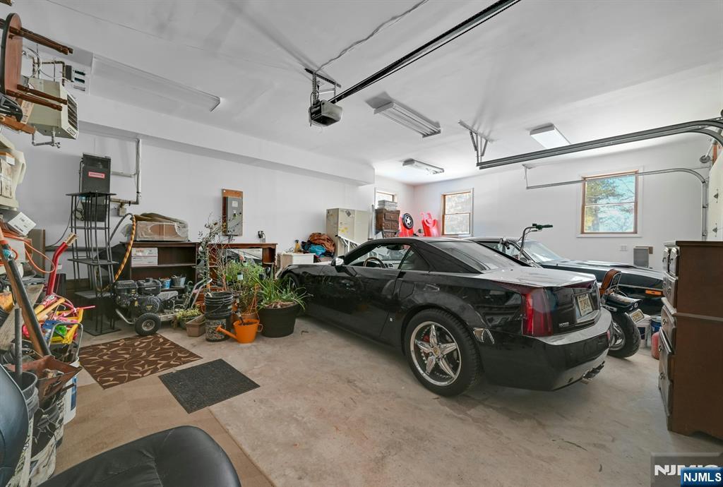 285 Chestnut Ridge Road Woodcliff Lake, NJ 07677 - Photo 46 of 46 a car is parked in a garage