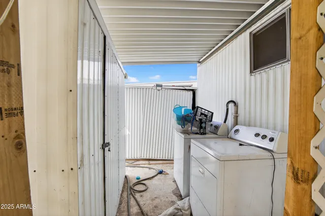 a utility room with dryer and washer