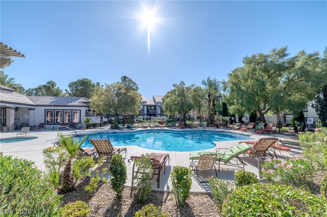 7255 West Sunset Road, Unit 2144 Las Vegas, NV 89113 - Photo 20 of 23 Community pool featuring a patio