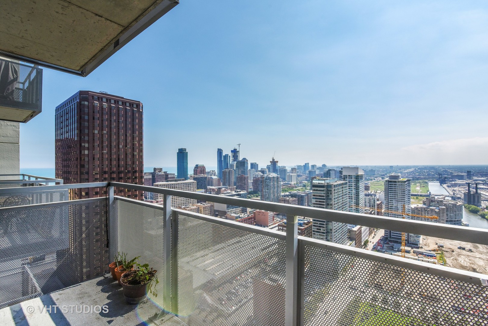 235 West Van Buren Street, Unit 3804 Chicago, IL 60607 - Photo 9 of 11 a view of a balcony with city view