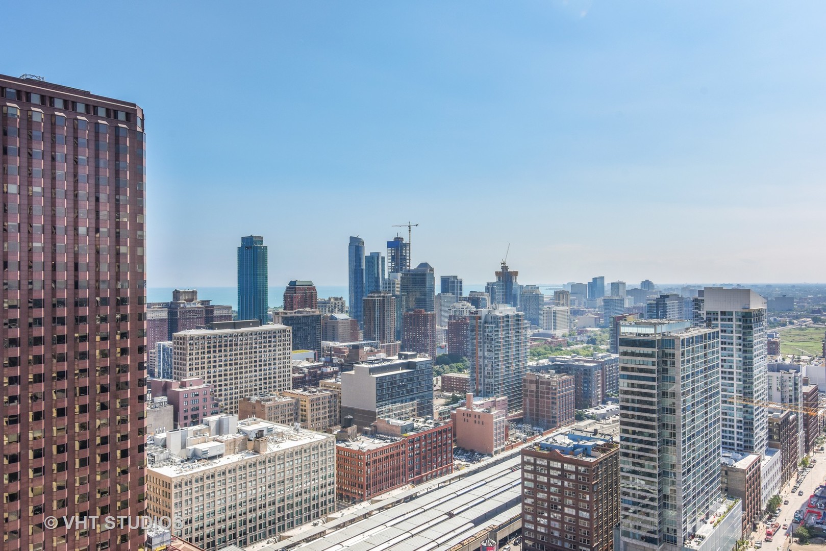 235 West Van Buren Street, Unit 3804 Chicago, IL 60607 - Photo 10 of 11 a view of a city with tall buildings
