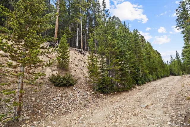 a view of a backyard of the house