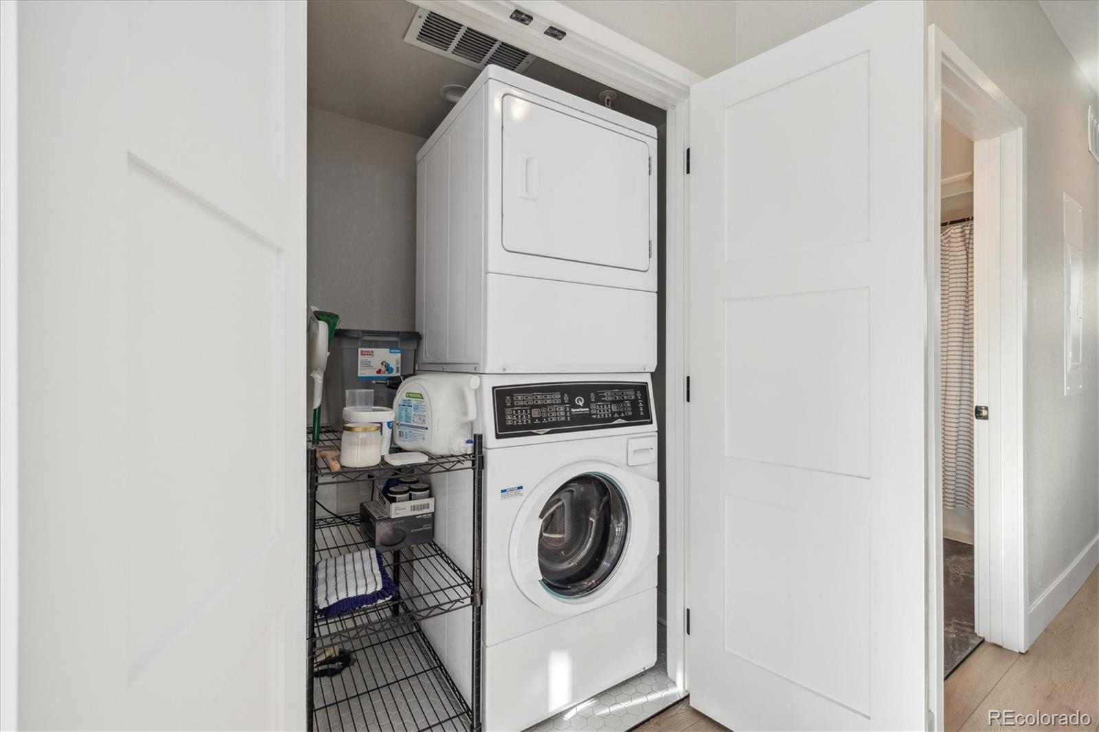 1401 Jackson Street, Unit 204 Golden, CO 80401 - Photo 16 of 26 a utility room with dryer and washer