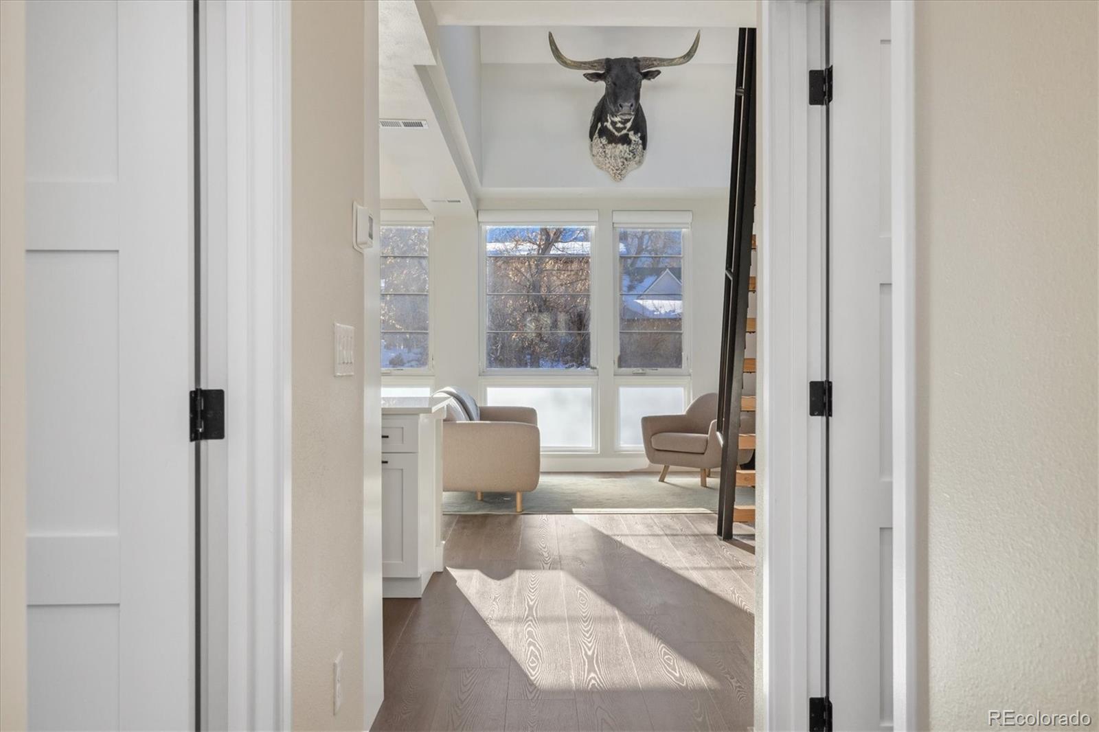 1401 Jackson Street, Unit 204 Golden, CO 80401 - Photo 7 of 26 a living room with furniture and a large window