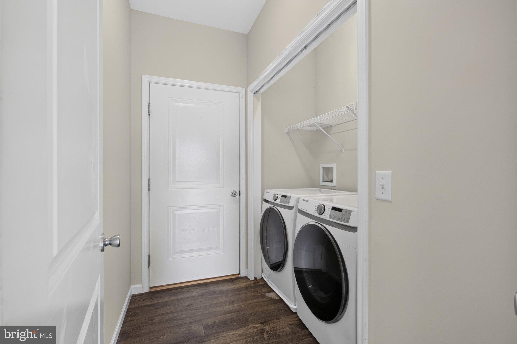 27 Sun Ridge Drive Felton, DE 19943 - Photo 29 of 61 Modern laundry nook with sleek appliances.