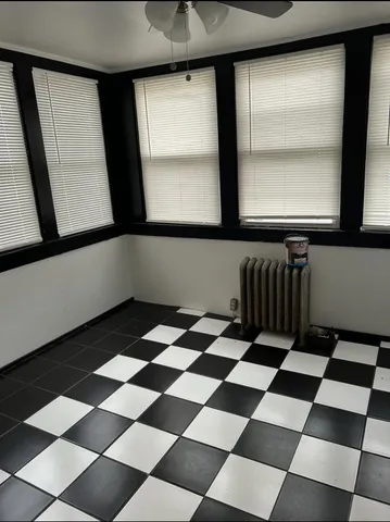a black and white checkered floor with a black white checkered floor