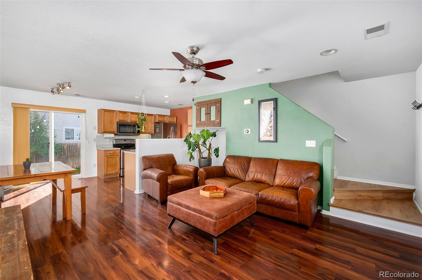 4570 South Swadley Court Morrison, CO 80465 - Photo 1 of 24 a living room with furniture and a large window