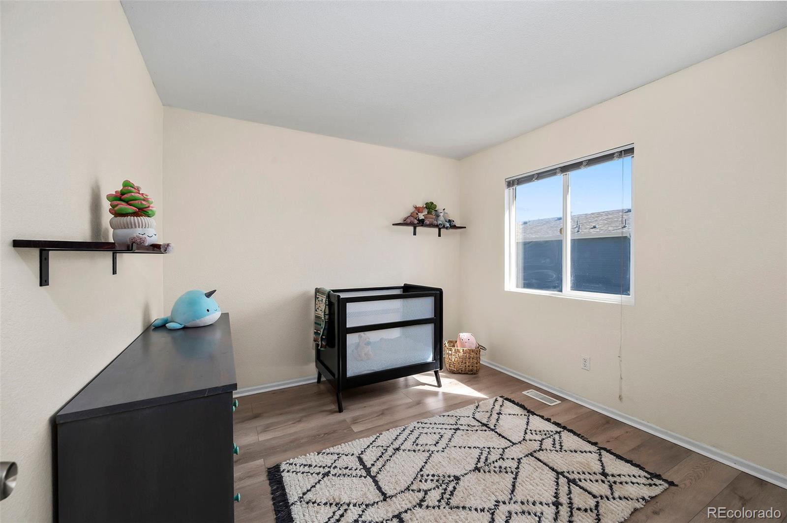 4570 South Swadley Court Morrison, CO 80465 - Photo 13 of 24 a view of an empty room and window