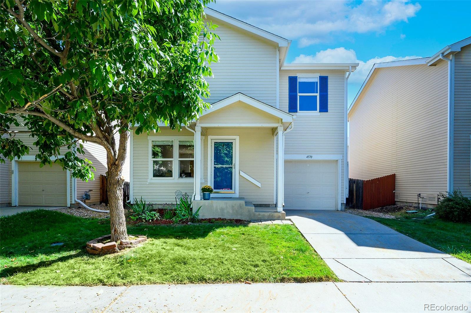 4570 South Swadley Court Morrison, CO 80465 - Photo 2 of 24 a front view of a house with a yard