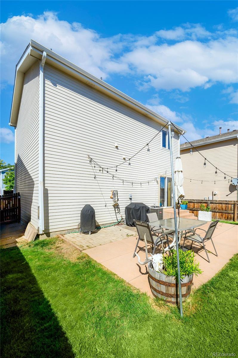 4570 South Swadley Court Morrison, CO 80465 - Photo 22 of 24 a view of a backyard with plants