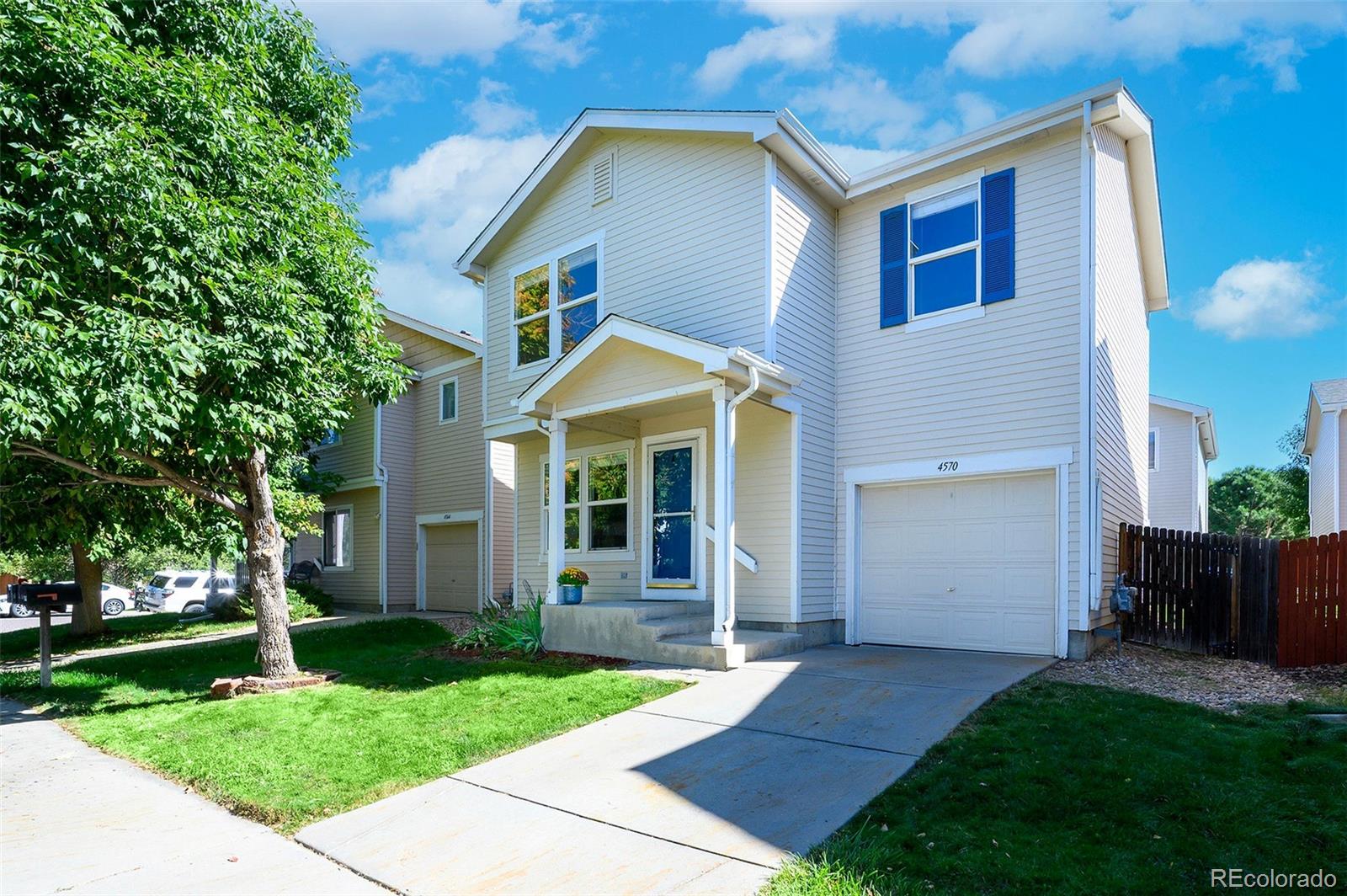 4570 South Swadley Court Morrison, CO 80465 - Photo 24 of 24 a front view of a house with a yard