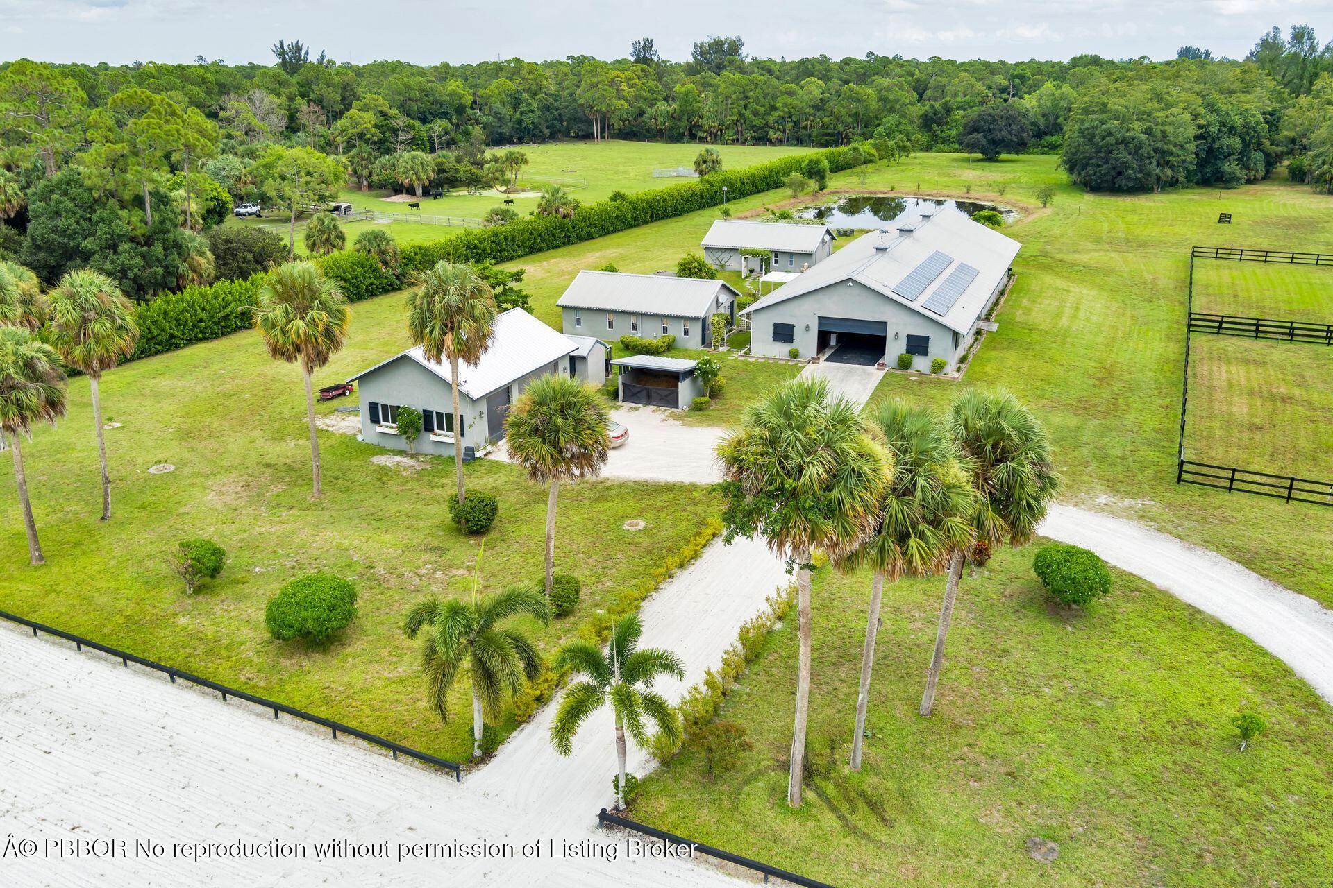 2770 E Road Loxahatchee, FL 33470 - Photo 48 of 51 a aerial view of a house with a garden