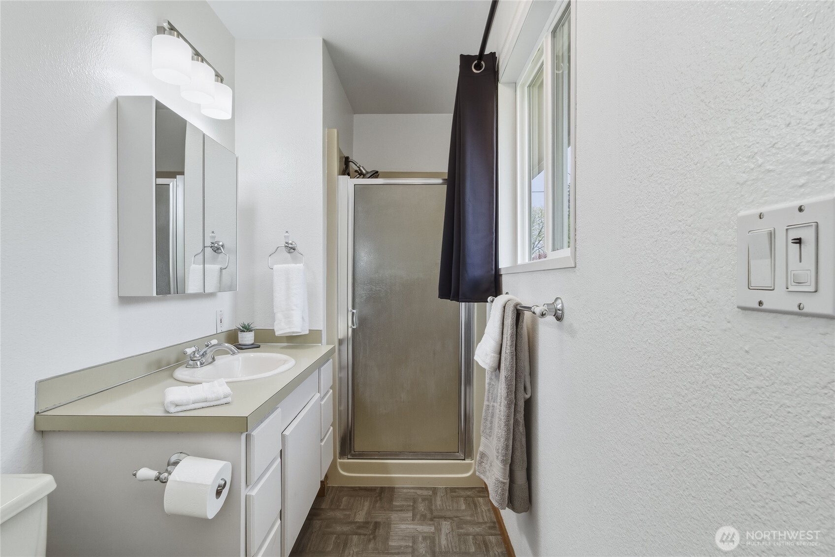 304 Southwest 11th Street College Place, WA 99324 - Photo 20 of 38 a bathroom with a double vanity sink and mirror