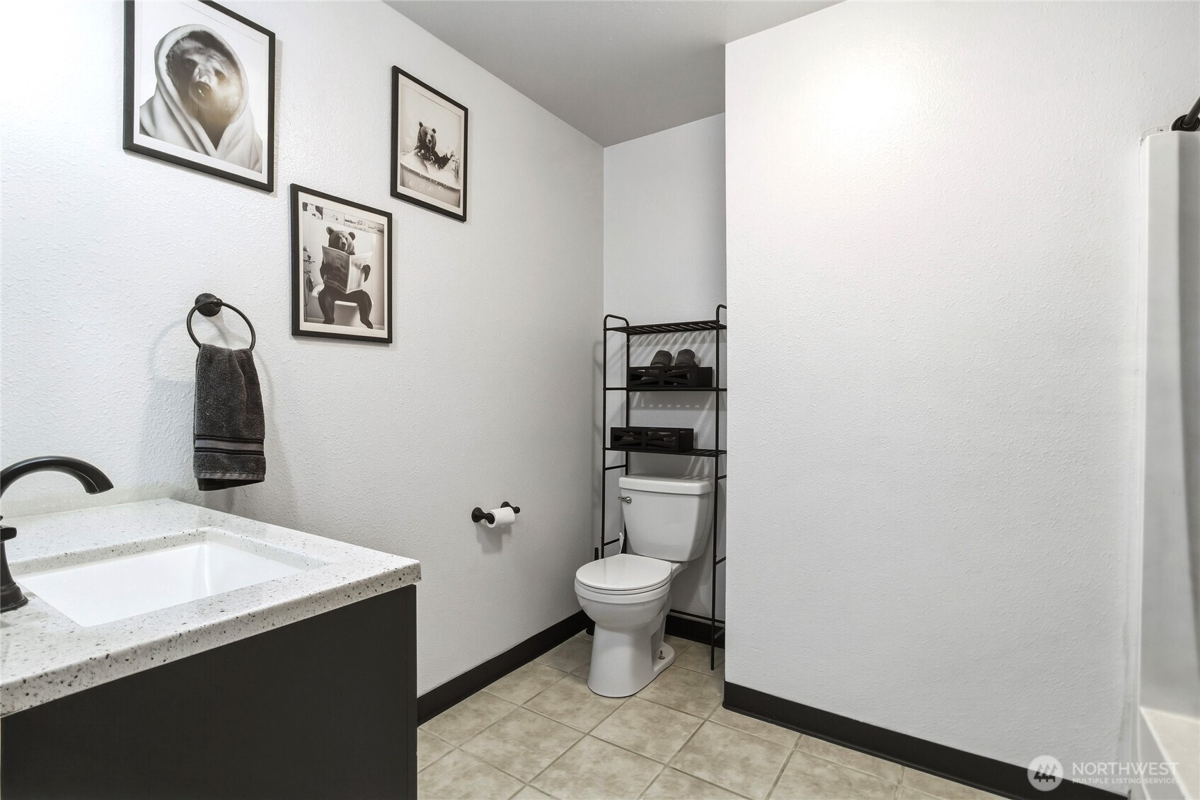 304 Southwest 11th Street College Place, WA 99324 - Photo 22 of 38 a bathroom with a sink and a toilet