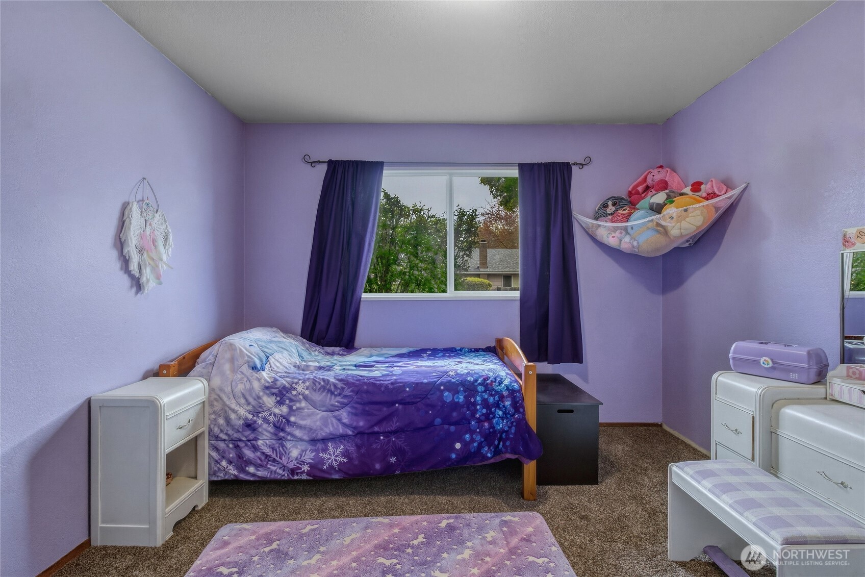 304 Southwest 11th Street College Place, WA 99324 - Photo 23 of 38 a bedroom with a bed and a couch