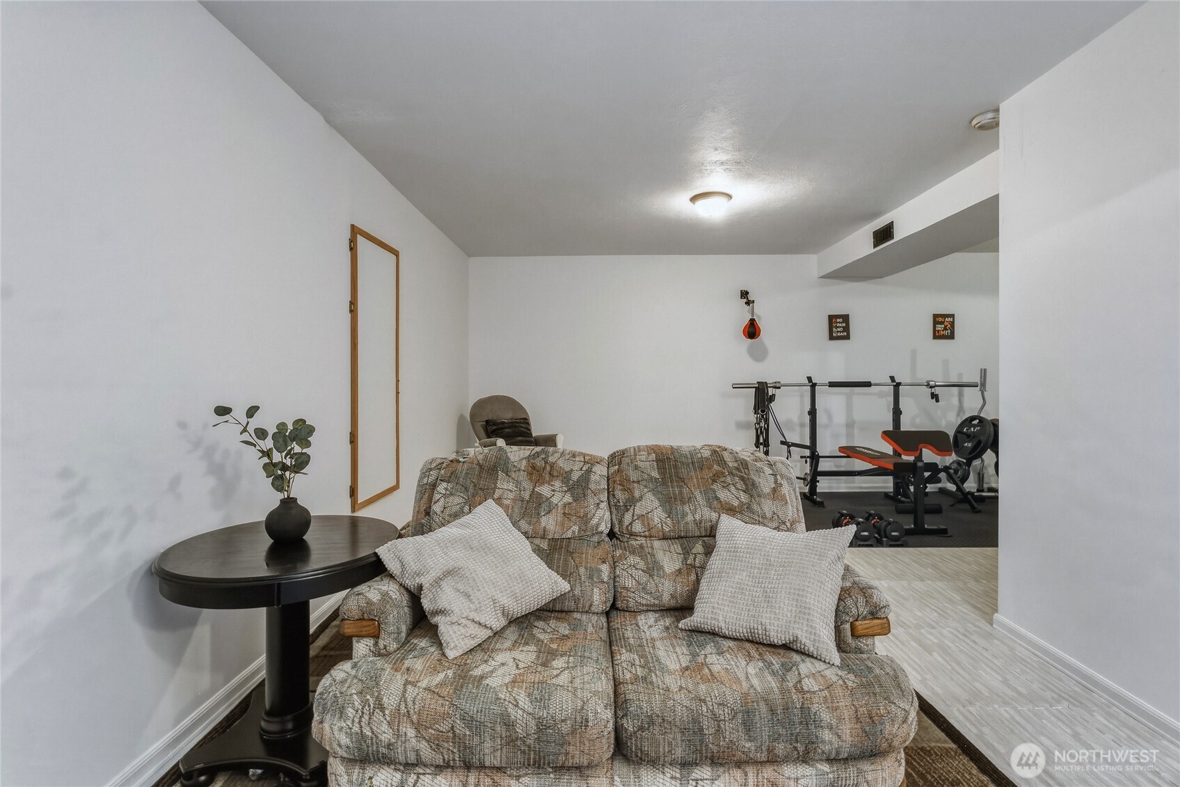 304 Southwest 11th Street College Place, WA 99324 - Photo 30 of 38 a living room with furniture and a potted plant