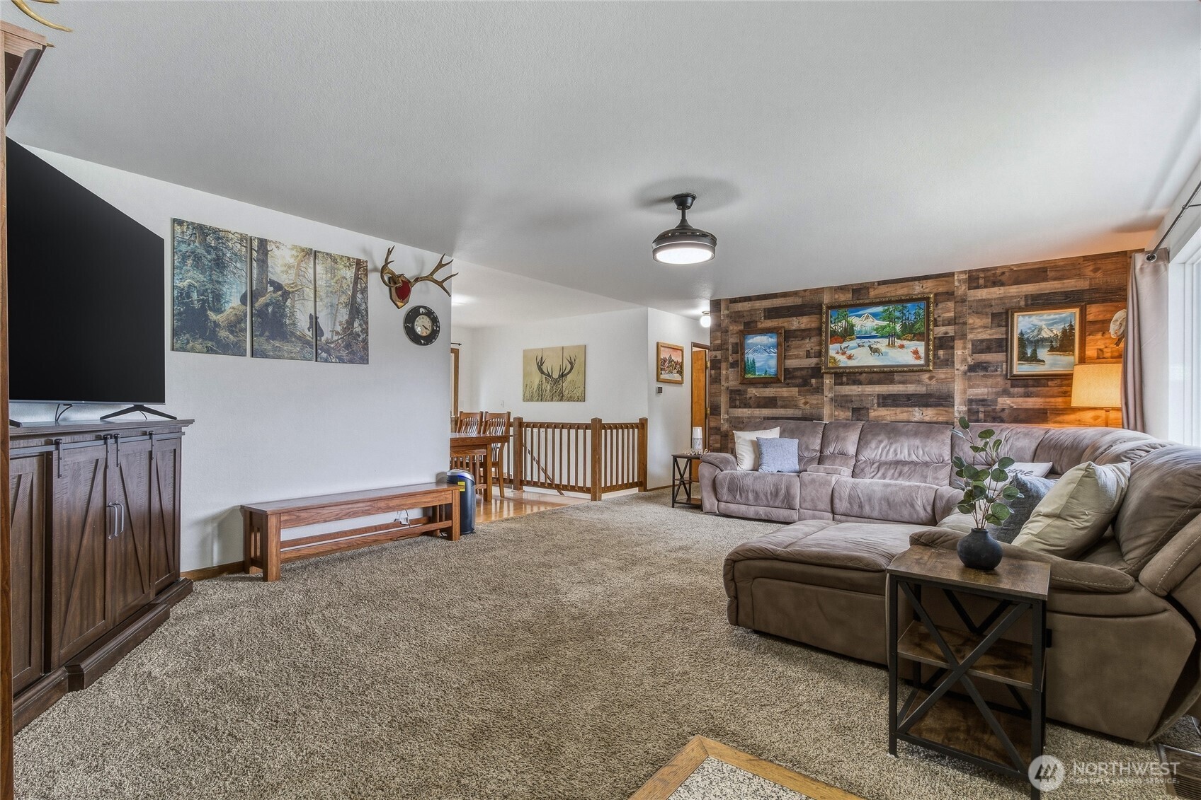304 Southwest 11th Street College Place, WA 99324 - Photo 3 of 38 a living room with furniture and a flat screen tv
