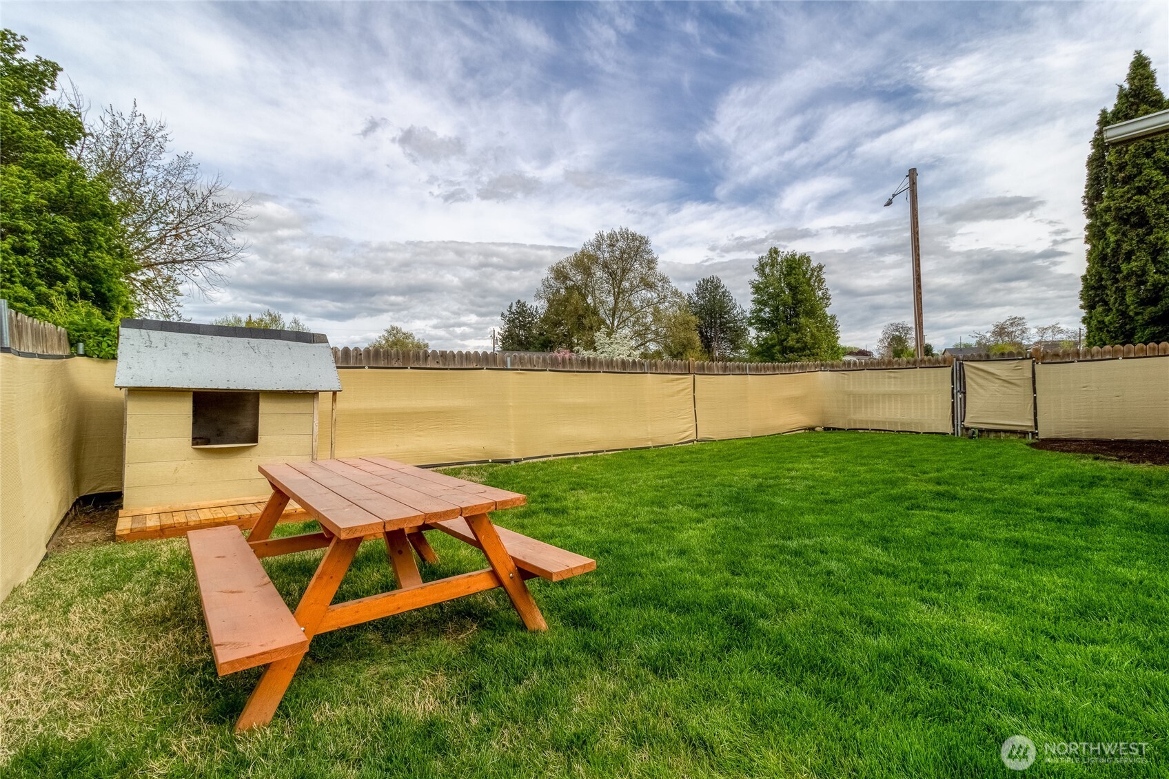 304 Southwest 11th Street College Place, WA 99324 - Photo 33 of 38 swimming pool with outdoor seating and green space
