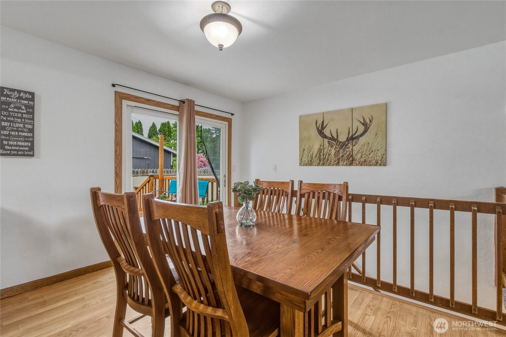 304 Southwest 11th Street College Place, WA 99324 - Photo 8 of 38 a view of a dining room with furniture window and wooden floor