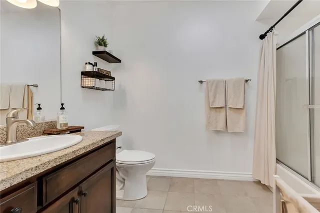 a view of a hallway with washer and dryer