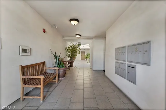 a view of parking garage with cars