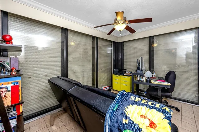 a room with furniture and flat screen tv