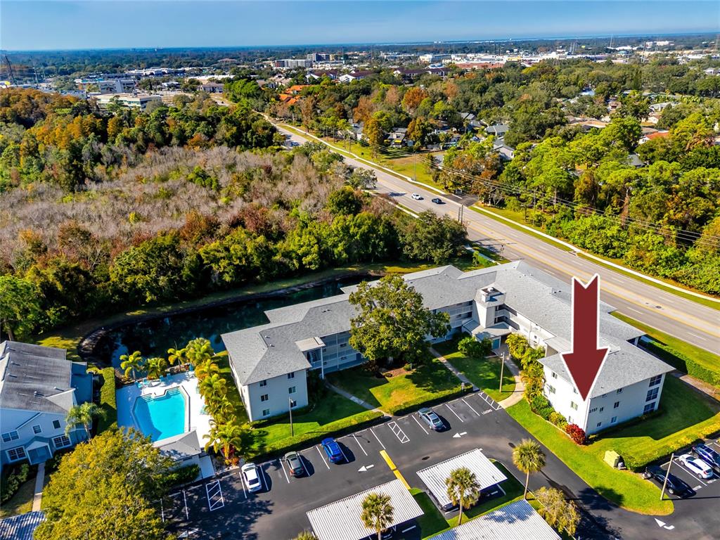 2737 Enterprise Road East, Unit 112 Clearwater, FL 33759 - Photo 38 of 43 an aerial view of a houses with a garden