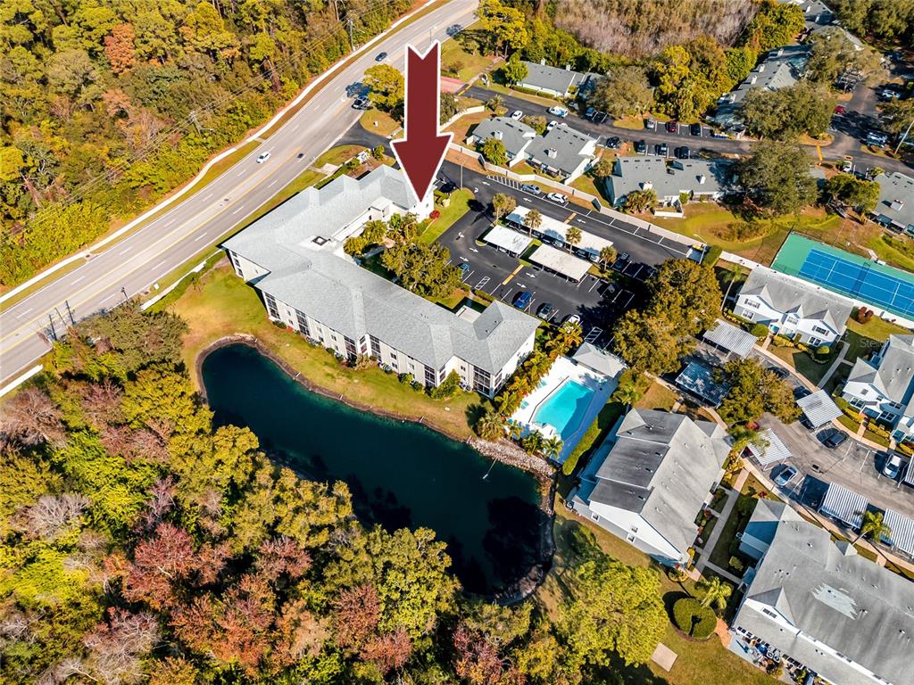 2737 Enterprise Road East, Unit 112 Clearwater, FL 33759 - Photo 43 of 43 view of a balcony with wooden floor