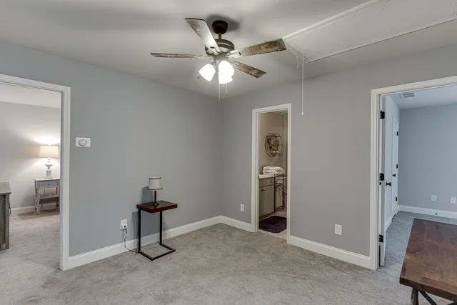 a view of an empty room and window