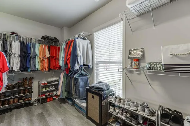 a outdoor living space with furniture and a floor to ceiling window