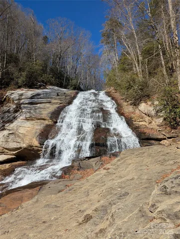 a view of a yard covered in snow