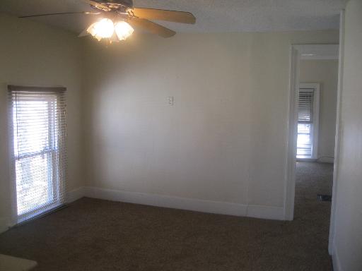 519 West State Street Sycamore, IL 60178 - Photo 7 of 16 an empty room with a window