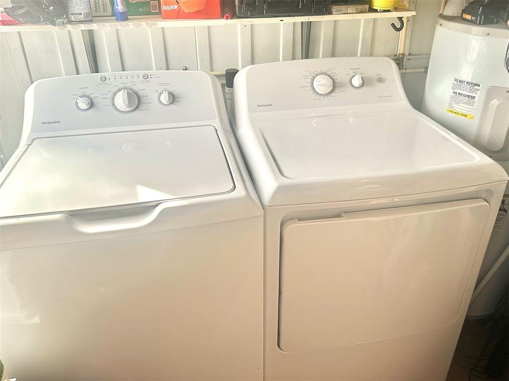 2000 East Bay Drive, Unit 102 Largo, FL 33771 - Photo 15 of 17 a utility room with dryer and washer