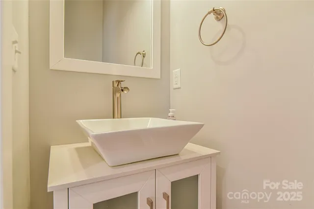 a view of storage and utility room with window