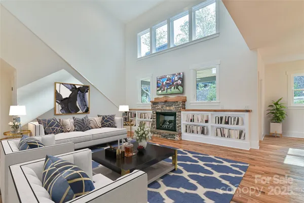 a living room with furniture and a rug