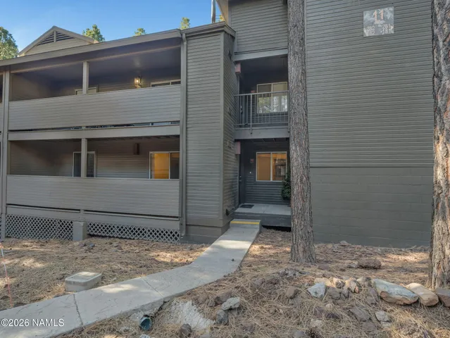 a house view with a outdoor space