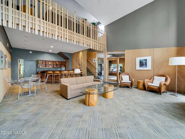 a room with gym equipment and a table